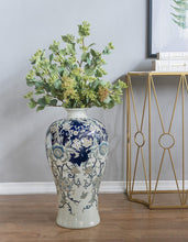 Load image into Gallery viewer, Elegant Bryn Porcelain Urn: A masterpiece in blue and gold, intricately detailed and crafted from durable porcelain with a high gloss glaze.
