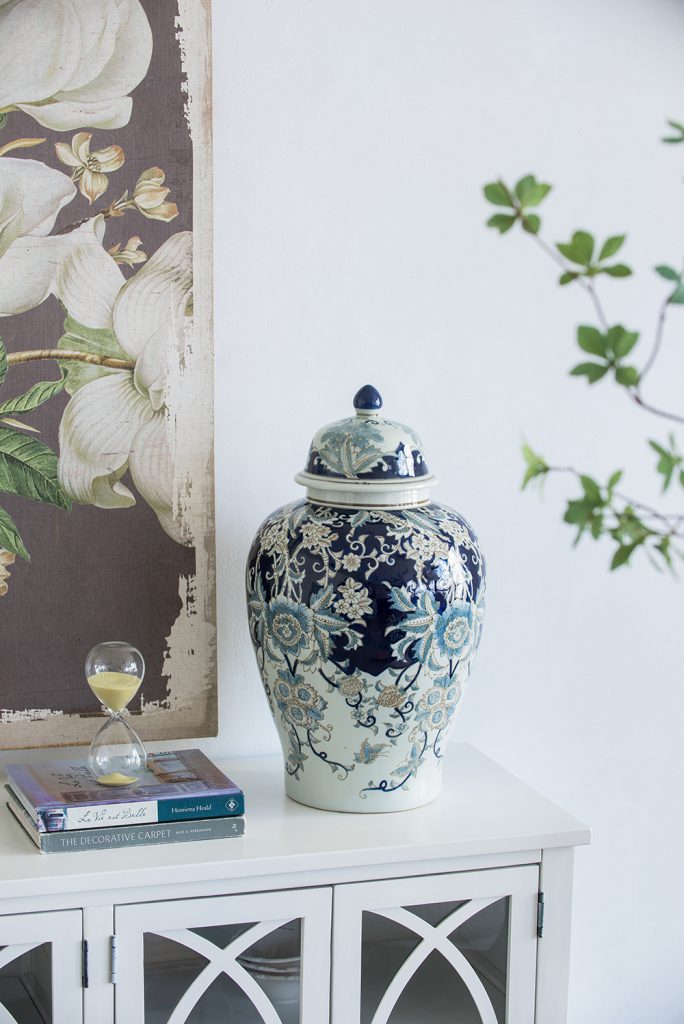Intricately detailed porcelain ginger jar in stunning blues and golds, a true work of art with a high gloss finish.