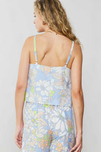 Load image into Gallery viewer, Stylish back view of a woman in a blue and white floral print set by Current Air, made with luxurious linen blend fabric.
