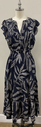 A beautiful dress featuring a delightful blue and white pattern, perfect for any fashionable occasion.
