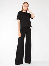 Load image into Gallery viewer, Short sleeve top with extended length, hitting at hip bone. Chic square silhouette, longer bodice, perfect for RR iconic pant. Ponte knit fabric for structured look and comfort.
