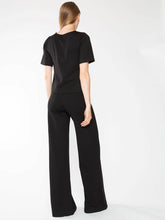 Load image into Gallery viewer, Short sleeve top with extended length, hitting hip bone. Chic square silhouette, longer bodice, perfect for RR iconic pant. Ponte knit fabric for structured look and comfort.
