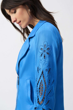 Load image into Gallery viewer, Faux-suede moto jacket featuring a notched collar, fitted silhouette, foiling, and embroidery for a refined biker style.

