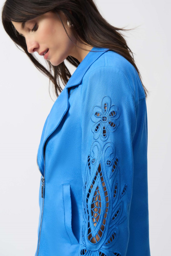 Faux-suede moto jacket featuring a notched collar, fitted silhouette, foiling, and embroidery for a refined biker style.
