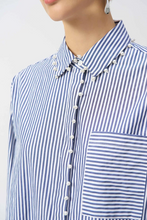 Load image into Gallery viewer, Versatile striped button-down shirt featuring soft stretch cotton, high-low hem, and pearl trim, ideal for various occasions.

