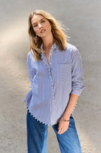 Load image into Gallery viewer, Timeless striped button-down shirt made of soft stretch cotton, with a chic high-low hem and pearl trim for stylish versatility.
