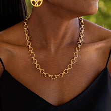 Load image into Gallery viewer, The Cleopatra Small Link Necklace in Hammered Gold, characterized by a minimalist design with a single large link.
