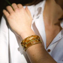 Load image into Gallery viewer, Berry Small Hinged Cuff in Teak with gold and brown beads.
