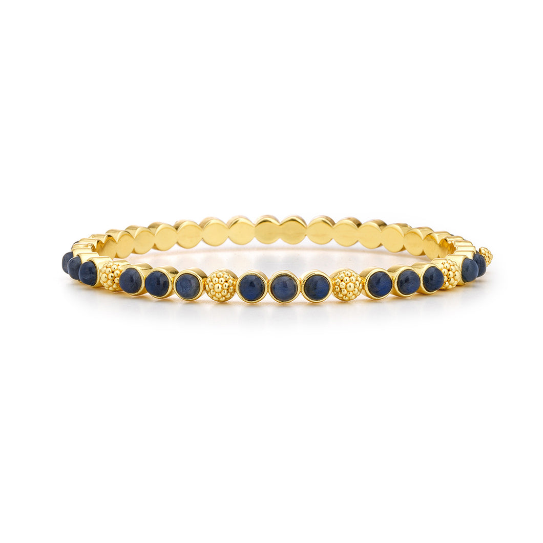 Gold and blue stone bracelet with Berry Gem Petite Hinged Bangle - Blue Labradorite.