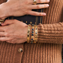 Load image into Gallery viewer, Gold band with sapphires, Berry Gem Classic Hinged Bangle - Blue Labradorite.
