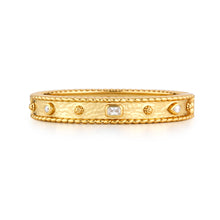 Load image into Gallery viewer, A gold band adorned with diamonds on the side, featuring the Berry Gem Hinged Bangle with clear cubic zirconia accents.
