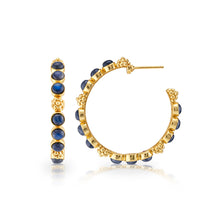 Load image into Gallery viewer, Elegant gold hoop earrings featuring blue sapphire stones, perfect for adding a touch of luxury to any outfit.
