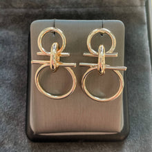 Load image into Gallery viewer, Handcrafted Golden Knot Earrings from Chakarr Jewelry, made of hypoallergenic stainless steel, offering unique style and comfort.
