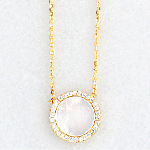 Adjustable gold necklace with a 10mm mother of pearl disc and sparkling CZ stones, measuring 16-18 inches in length.