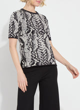 Load image into Gallery viewer, Stylish black and white top crafted from patterned fabric: Preston Knit Short Sleeve Sweater by Lysse.
