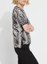 Load image into Gallery viewer, Monochrome top with patterned fabric: Preston Knit Short Sleeve Sweater by Lysse.
