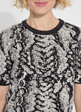 Load image into Gallery viewer, Lysse&#39;s Preston Knit Short Sleeve Sweater in black and white pattern.
