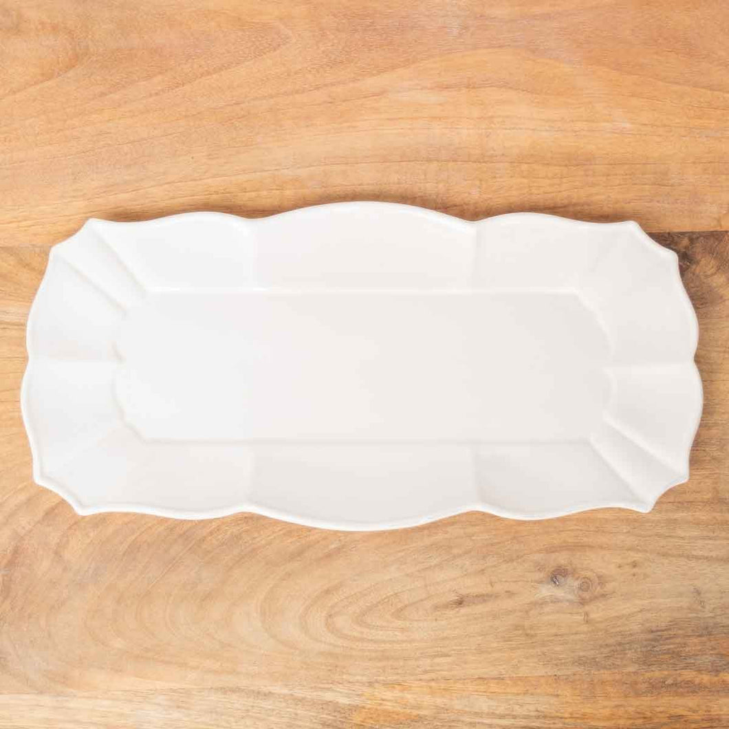 Elegant rectangular platter with intricate designs, perfect for serving appetizers or desserts.