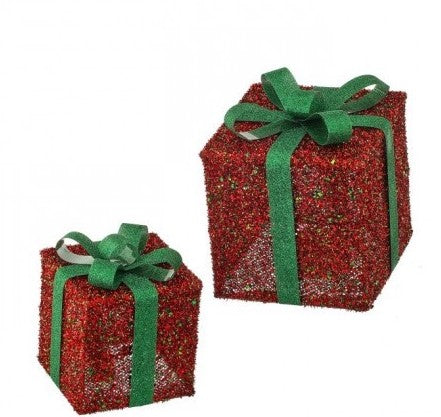 Festive Christmas gift boxes with glittery accent.